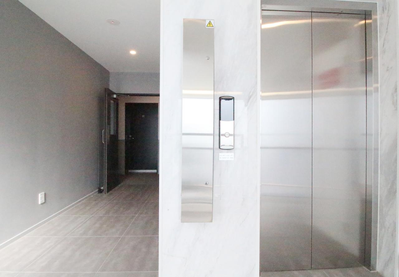 伯肯黑德fernz汽车旅馆和公寓 奥克兰 外观 照片 A residential elevator