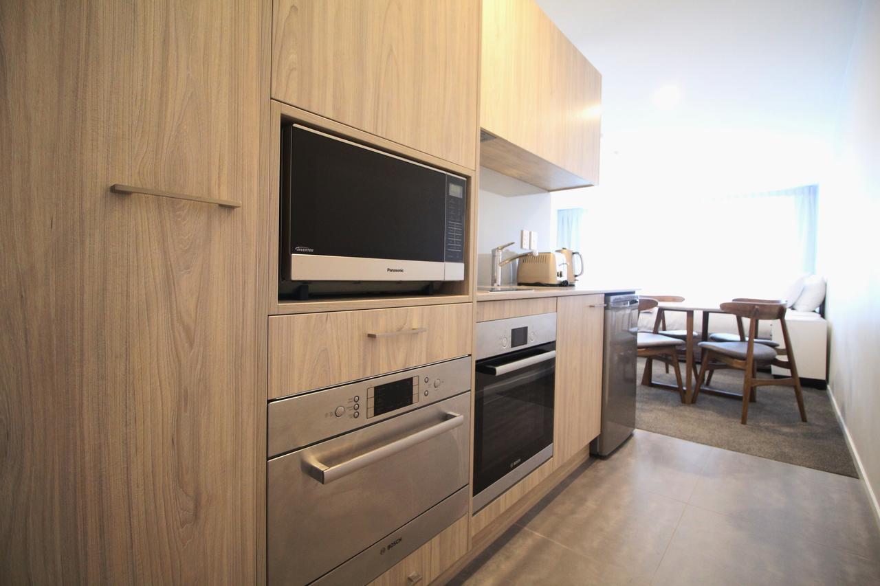 伯肯黑德fernz汽车旅馆和公寓 奥克兰 客房 照片 A kitchen in a student apartment at the University of Melbourne